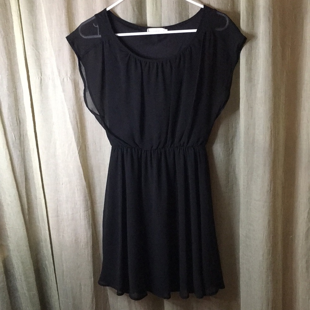 Lush black dress with cinched waist